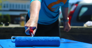 Community - person painting using a roller